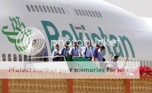 Indian cricket team members make their way out of a Pakistan Airlines flight upon arrival at Jinnah International Airport, Karachi, Pakistan, Friday, March 12, 2004.(AP Photo/Shakil Adil)